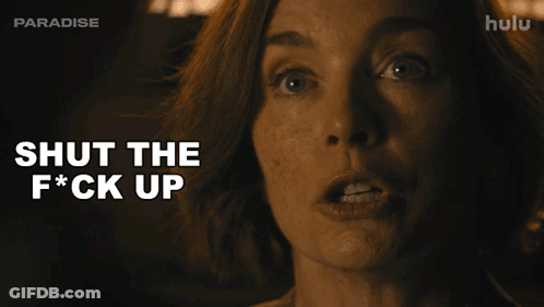 A Close Up Of A Woman 'S Face With The Words Shut The F * Ck Up GIF