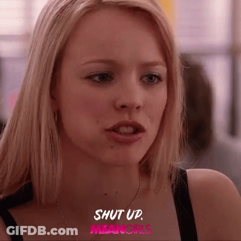 A Close Up Of A Woman 'S Face With The Words Shut Up Mean Girls Written Above Her GIF