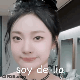 A Close Up Of A Woman 'S Face With The Words Soy De Lia Written On The Bottom . GIF
