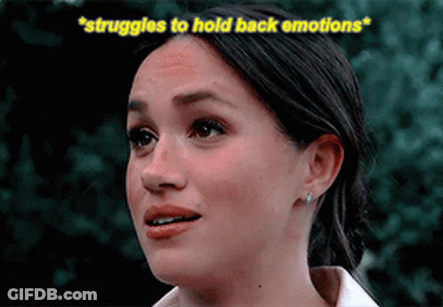 A Close Up Of A Woman 'S Face With The Words Struggles To Hold Back Emotions Above Her GIF