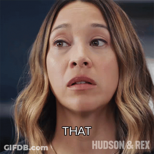 A Close Up Of A Woman 'S Face With The Words That Hudson & Rex Above Her GIF