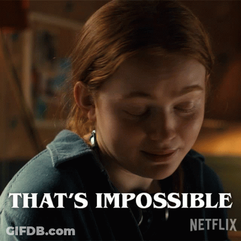 A Close Up Of A Woman 'S Face With The Words That 'S Impossible Above Her GIF