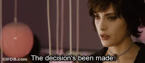 A Close Up Of A Woman 'S Face With The Words `` The Decision 'S Been Made '' Written On The Bottom . GIF