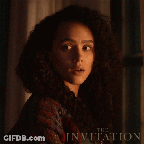 A Close Up Of A Woman 'S Face With The Words " The Invitation " On The Bottom GIF