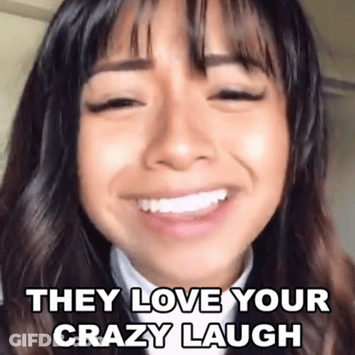 A Close Up Of A Woman 'S Face With The Words `` They Love Your Crazy Laugh '' On It . GIF