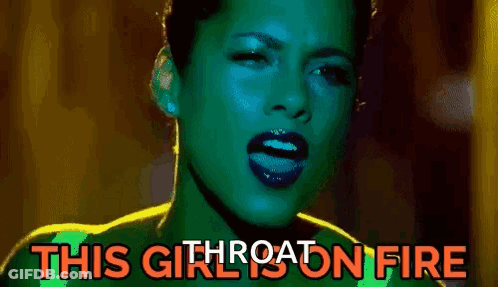 A Close Up Of A Woman 'S Face With The Words `` This Girl Is On Fire '' Written On The Bottom . GIF