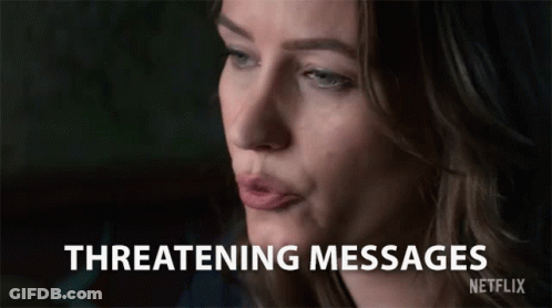 A Close Up Of A Woman 'S Face With The Words Threatening Messages Written On The Bottom GIF