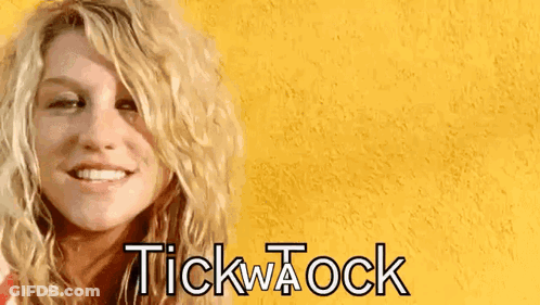 A Close Up Of A Woman 'S Face With The Words Tick A Ock Written On It GIF
