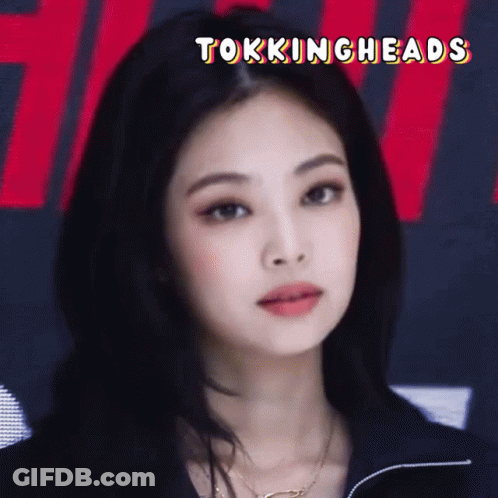 A Close Up Of A Woman 'S Face With The Words " Tokingheads " Above Her GIF