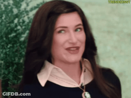 A Close Up Of A Woman 'S Face With The Words Trendizisst On The Bottom Right GIF