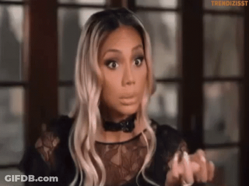 A Close Up Of A Woman 'S Face With The Words Trendizisst On The Bottom GIF