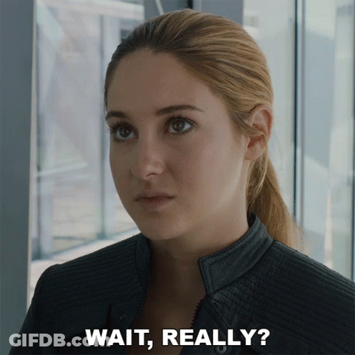 A Close Up Of A Woman 'S Face With The Words Wait Really Below It GIF
