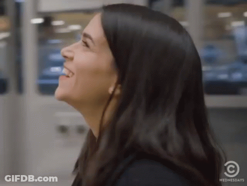 A Close Up Of A Woman 'S Face With The Words Wednesdays On The Bottom GIF