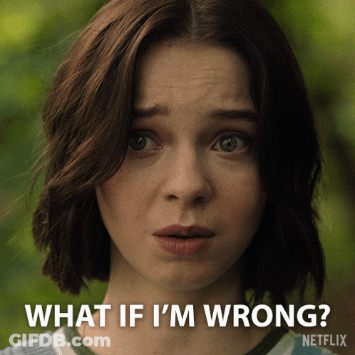 A Close Up Of A Woman 'S Face With The Words " What If I 'M Wrong " Above Her GIF