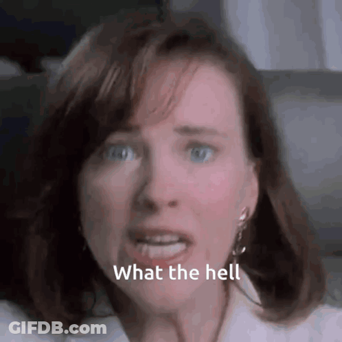 A Close Up Of A Woman 'S Face With The Words `` What The Hell '' Written On The Bottom . GIF