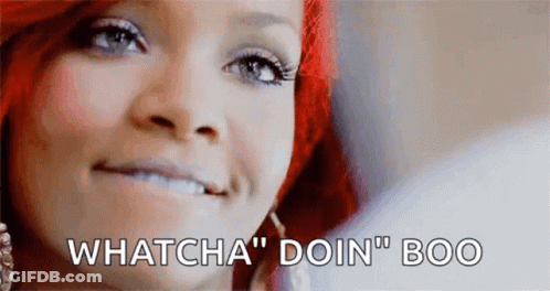 A Close Up Of A Woman 'S Face With The Words `` Whatcha ' Doin ' Boo '' Written Above Her . GIF