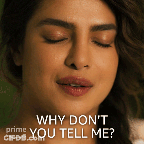 A Close Up Of A Woman 'S Face With The Words " Why Don 'T You Tell Me " GIF