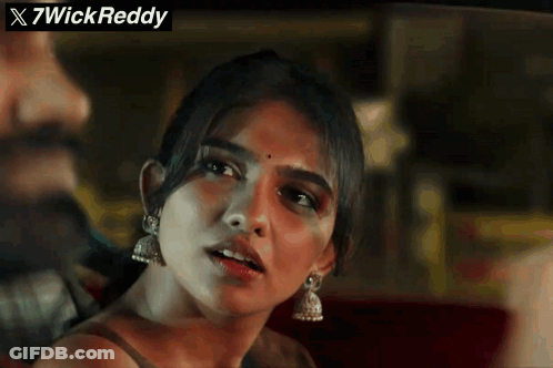 A Close Up Of A Woman 'S Face With The Words X7wickreddy Written Above Her GIF