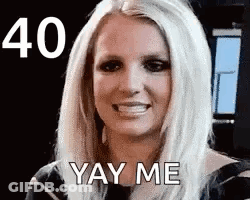 A Close Up Of A Woman 'S Face With The Words `` Yay Me '' Written On It . GIF