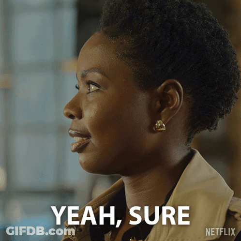 A Close Up Of A Woman 'S Face With The Words Yeah Sure Below Her GIF