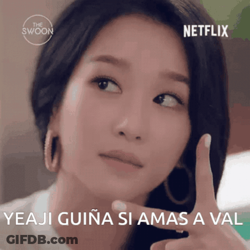 A Close Up Of A Woman 'S Face With The Words Yeaji Guina Si Amas A Val Written Below Her GIF