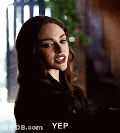 A Close Up Of A Woman 'S Face With The Words Yep Written On The Bottom . GIF