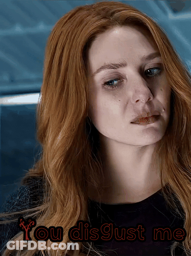 A Close Up Of A Woman 'S Face With The Words You Disgust Me Below It GIF