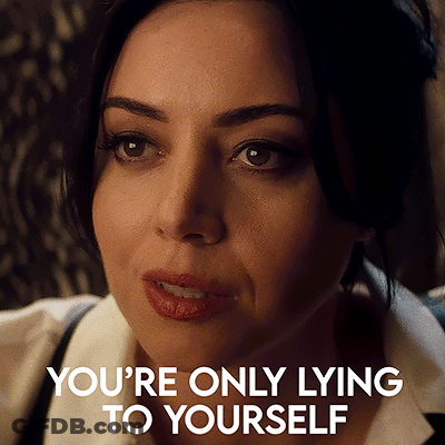 A Close Up Of A Woman 'S Face With The Words You 'Re Only Lying To Yourself Above Her GIF