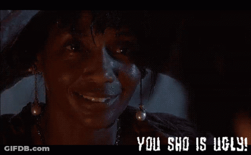 A Close Up Of A Woman 'S Face With The Words You Sho Is Ugly On The Bottom GIF