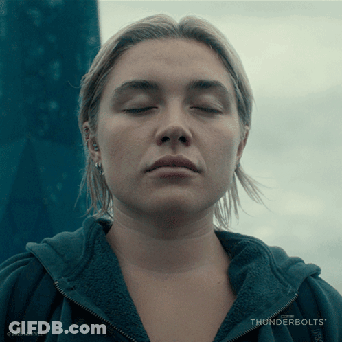 A Close Up Of A Woman 'S Face With Thunderbolts Written On The Bottom Right GIF