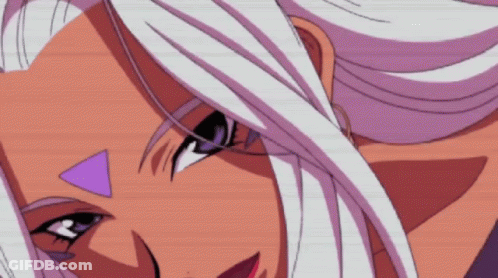 A Close Up Of A Woman 'S Face With White Hair And A Purple Triangle On Her Forehead GIF