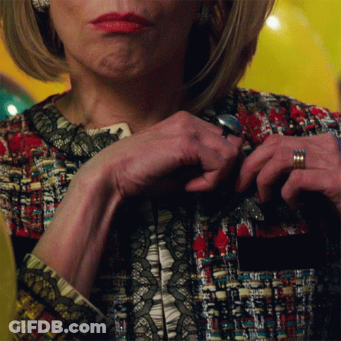 A Close Up Of A Woman 'S Hands With A Ring On Her Finger GIF