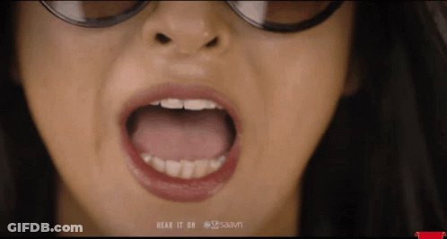 A Close Up Of A Woman 'S Mouth With The Words " Hear It On Saavn " Below It GIF