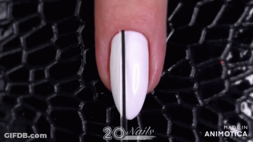 A Close Up Of A Woman 'S Nail With The Words 20 Nails Made In Animatica GIF