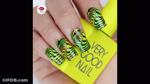 A Close Up Of A Woman 'S Nails With A Very Good Nail Polish GIF