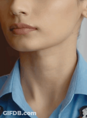 A Close Up Of A Woman 'S Neck And Chin GIF