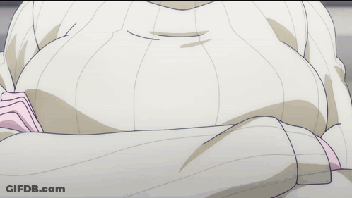A Close Up Of A Woman 'S Torso With A Turtleneck Sweater GIF