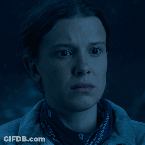 A Close Up Of A Woman Wearing A Bandana That Says ' Converse ' GIF