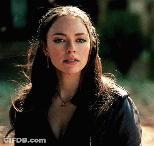 A Close Up Of A Woman Wearing A Black Jacket GIF