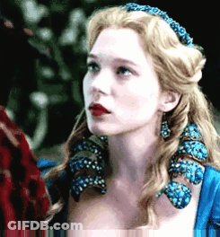 A Close Up Of A Woman Wearing A Blue Dress GIF
