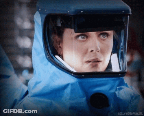 A Close Up Of A Woman Wearing A Blue Helmet With The Words Hollywoodfangirl On The Bottom GIF