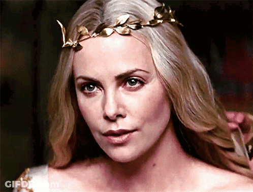 A Close Up Of A Woman Wearing A Crown GIF