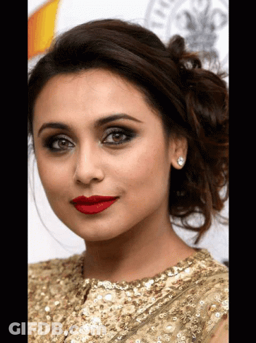 A Close Up Of A Woman Wearing Red Lipstick GIF