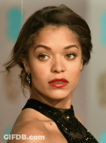 A Close Up Of A Woman Wearing Red Lipstick GIF