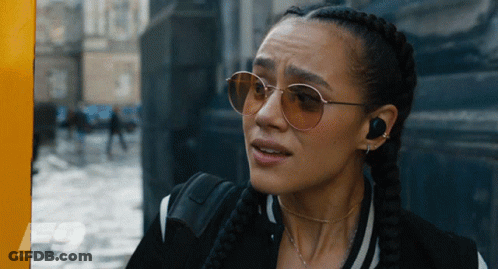A Close Up Of A Woman Wearing Sunglasses With The Fast Saga Written On The Bottom GIF