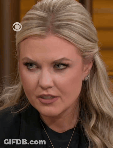 A Close Up Of A Woman With A Cbs Logo On Her Head GIF