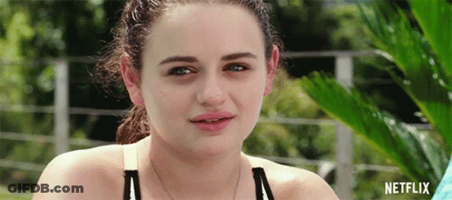 A Close Up Of A Woman With A Netflix Logo In The Corner GIF