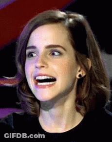 A Close Up Of A Woman With A Surprised Look On Her Face GIF