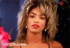 A Close Up Of A Woman With A Wig On GIF