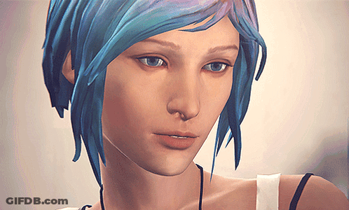 A Close Up Of A Woman With Blue Hair And Blue Eyes GIF